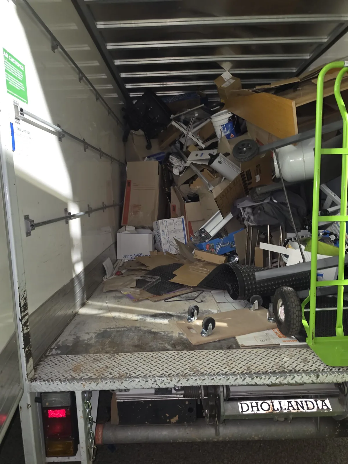 Truck loaded with construction waste and old furniture during a Perth rubbish removal job